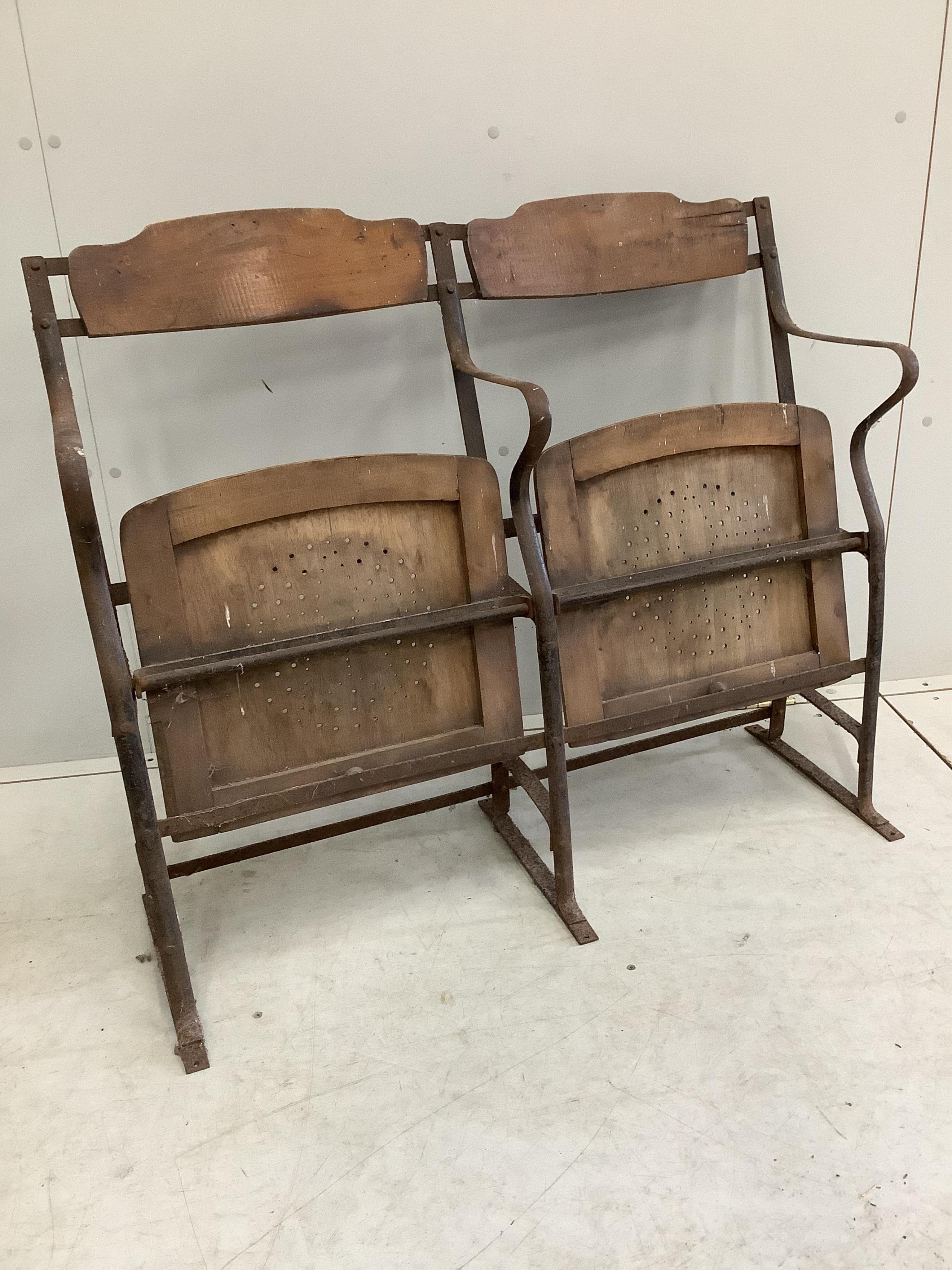 Three vintage French wrought iron and beech folding cinema seat rows, each width 193cm, height 84cm. Condition - poor
